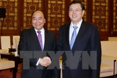 Activités du Premier ministre Nguyen Xuan Phuc à Pékin