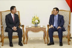 Le vice-PM Vuong Dinh Hue demande à Shinhan Card de développer la fintech au Vietnam