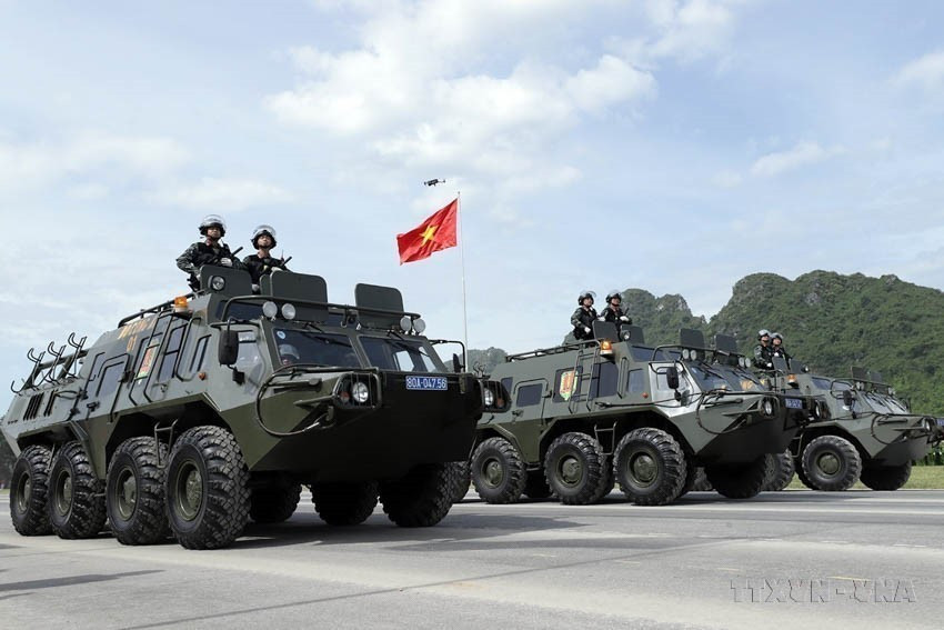 Un convoi de véhicules spécialisés polyvalents du Commandement de la Police mobile lors d'une répétition générale du défilé commémorant le 80e anniversaire de la Révolution d'Août et de la Fête nationale du 2 septembre. Photo: VNA