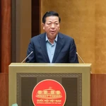 Le ministre de la Construction, Trân Hông Minh s'exprime à la session. Photo : tuoitre.vn