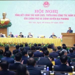 Le Premier ministre Pham Minh Chinh s'exprime lors de la conférence. Photo: VNA