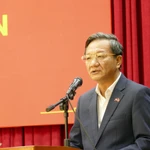 L'ambassadeur du Vietnam au Laos, Nguyen Minh Tam, s'exprime à la rencontre. Photo: VNA