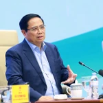 Le Premier ministre Pham Minh Chinh s'exprime au 7e Dialogue avec les agriculteurs, le 10 décembre à Hanoï. Photo: VNA