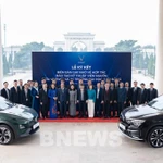 Les délégués à la cérémonie de signature de l'accord de coopération. Photo: VNA