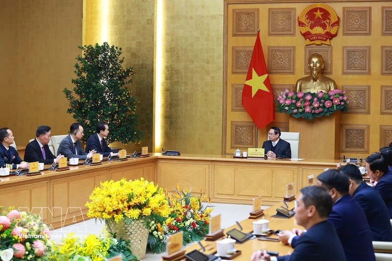 Le Premier ministre Pham Minh Chinh reçoit l'ambassadeur de Chine au Vietnam, He Wei. Photo : VNA
