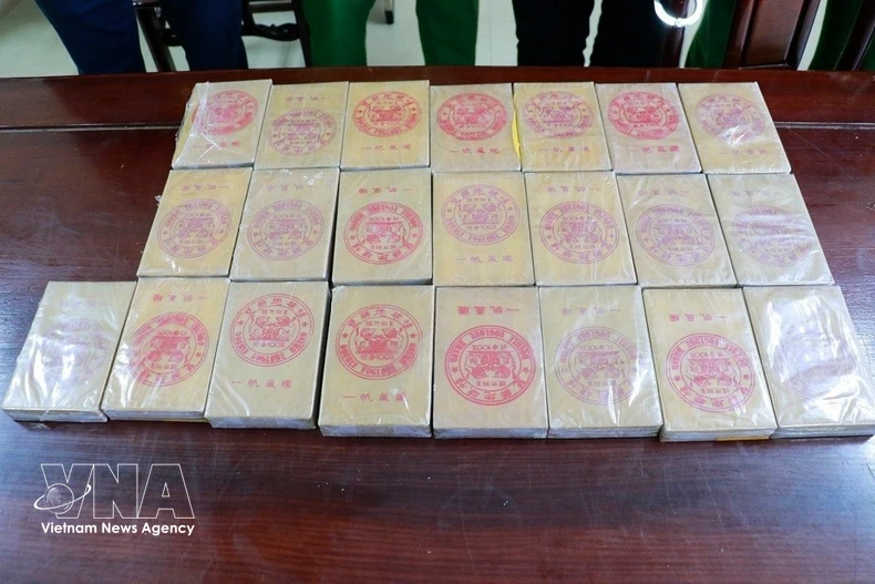 Saisie de 22 pains d’héroïne dans le cadre de l'affaire. Photo: VNA