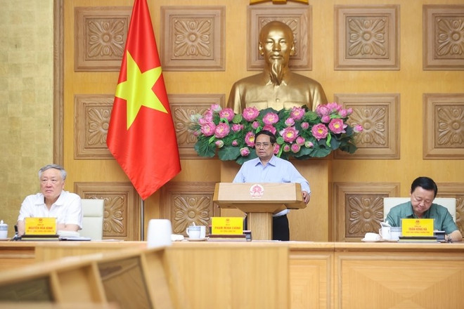 Le Premier ministre Pham Minh Chinh prend la parole lors de la réunion. Photo: VGP tt2.jpg