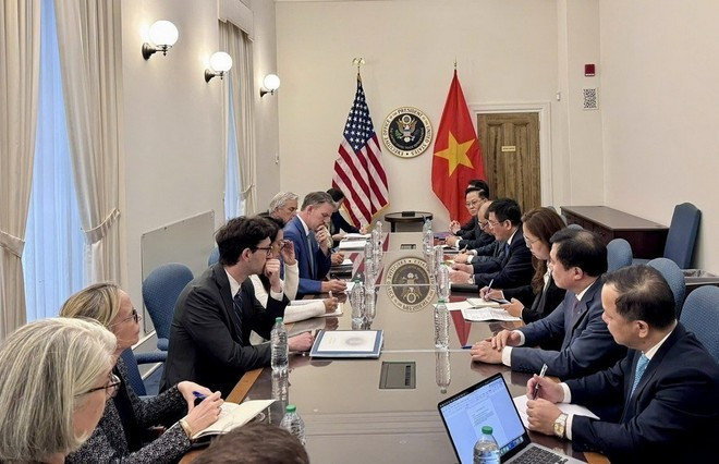 Séance de négociations entre les deux parties. Photo: VNA dam-phan-viet-nam-hoa-ky-2.jpg