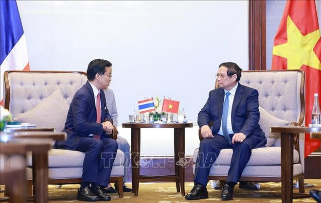 Le Premier ministre Pham Minh Chinh et Jormsup Lochaya, président du Super Energy Group de Thaïlande. Photo : VNA uuidc722fc4e-c16c-41f6-be5e-03782480d7c6code001library1type1mode1loctruecaptrue.jpg
