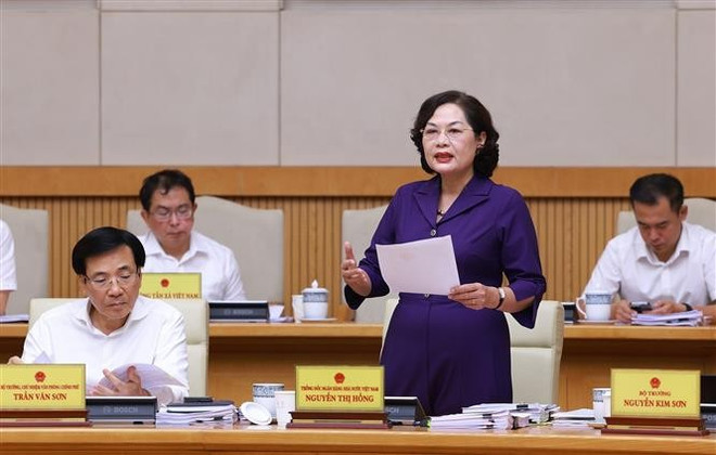 87 / 5 000 Nguyen Thi Hong, gouverneure de la Banque d'État du Vietnam, prend la parole. Photo : VNA vna-potal-thu-tuong-chu-tri-phien-hop-chinh-phu-chuyen-de-ve-xay-dung-phap-luat-thang-6-nam-2025-8104874.jpg