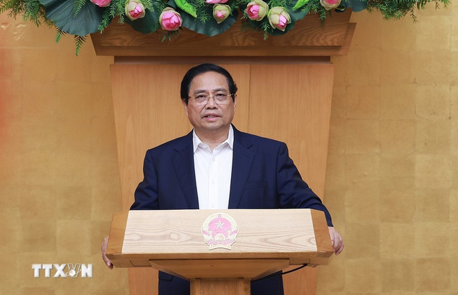 Le Premier ministre Pham Minh Chinh lors de la réunion. Photo: VNA pm.jpg