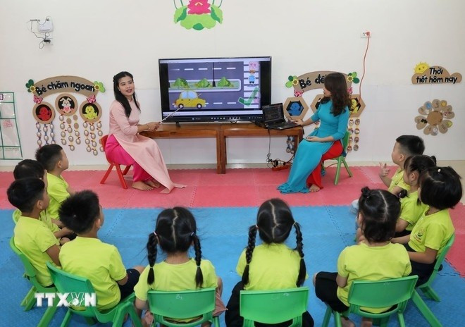 En 2024, les dĂ©penses totales du budget de l'Ătat pour l'Ă©ducation et la formation se sont Ă©levĂ©es Ă prĂšs de 381.000 milliards de dongs. Photo: VNA 420250109105548.jpg