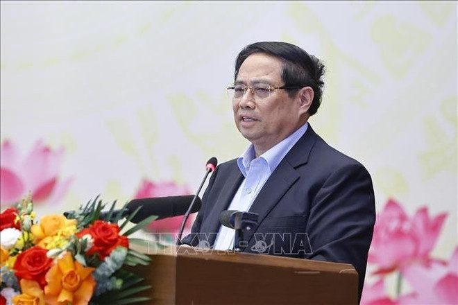 Le Premier ministre Pham Minh Chinh prend la parole lors de l'événement. Photo: VNA uuida262ed27-40e5-4d45-9817-0d220e72efcfcode001library1type1mode1loctruecaptrue.jpg