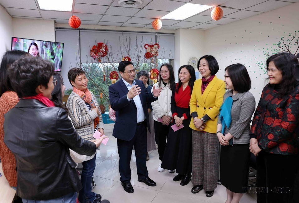 Le Premier ministre Pham Minh Chinh adresse ses meilleurs vœux de bonne Année aux journalistes de la VNA, le 9 février 2024. Photo : VNA