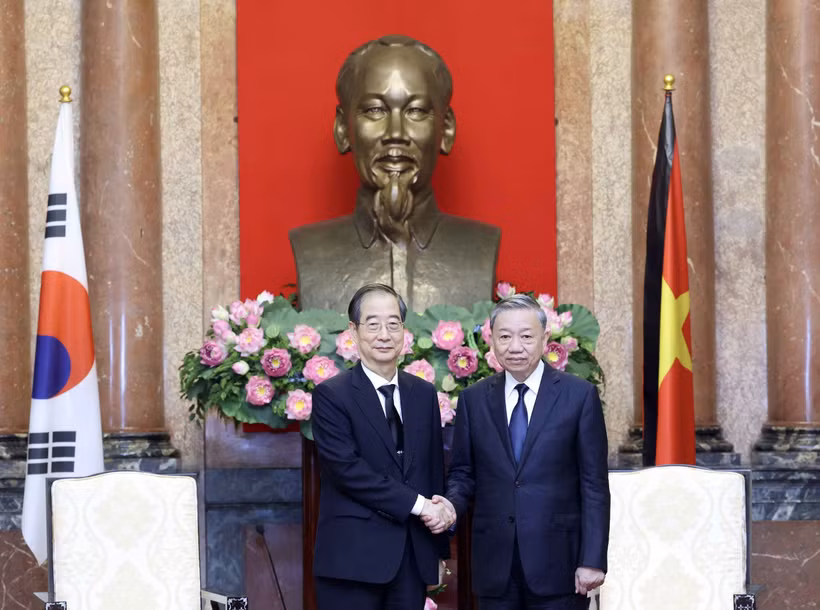 Le président To Lam (droite) et le Premier ministre Han Duck Soo. Photo : VNA
