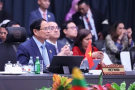 Le Premier ministre Pham Minh Chinh lors de la session plénière. Photo: VNA