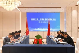 L'entretien entre les deux ministères de la Construction du Vietnam et du Logement et du Développement urbain et rural. Photo: baomoi.com 