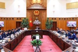 Le Premier ministre Pham Minh Chinh a présidé ce samedi 25 janvier une visioconférence sur la mise en œuvre de la première phase du projet de l'aéroport international de Long Thanh, installé dans la province de Dông Nai (Sud). Photo: VNA