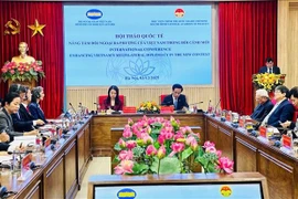 Colloque scientifique international intitulé « Rehausser la diplomatie multilatérale du Vietnam dans la nouvelle conjoncture ». Photo: VNA