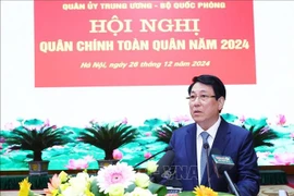 Le président Luong Cuong s'exprime lors de à la conférence militaro-politique nationale 2024. Photo: VNA