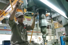 Les produits industriels transformés représentent 88,4 % du chiffre d'affaires à l'exportation au premier trimestre. Photo: VietnamPlus