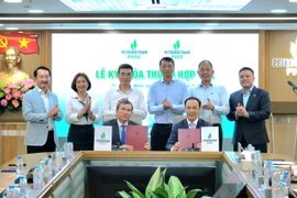 Cérémonie de signature de l'accord de coopération. Photo: petrotimes.vn