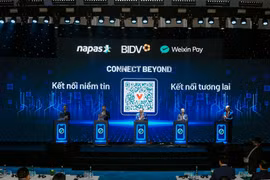 Cérémonie d'annonce de l'extension du service de paiement transfrontalier par QR code entre le Vietnam et la Chine. Photo: NAPAS