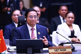 Le Premier ministre Pham Minh Chinh s'exprime lors de session plénière du 46e Sommet de l'ASEAN. Photo: VNA 