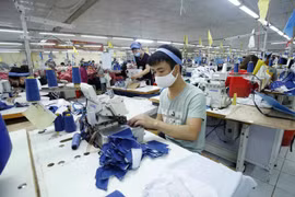 Production dans une usine. Photo: VNA