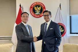 Le général de division Pham Thê Tung, vice-ministre de la Sécurité publique (gauche), et le directeur adjoint de l’Agence nationale indonésienne de lutte contre le terrorisme (BNPT), Andhika Chrisnayudhanto. Photo: VNA