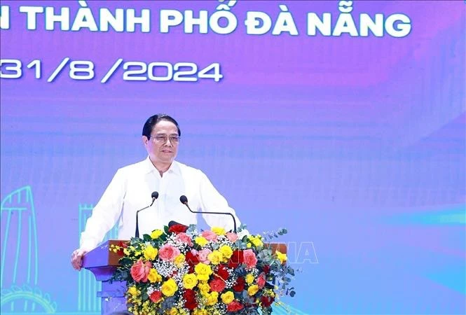 Le Premier ministre Pham Minh Chinh lors de la conférence. Photo: VNA