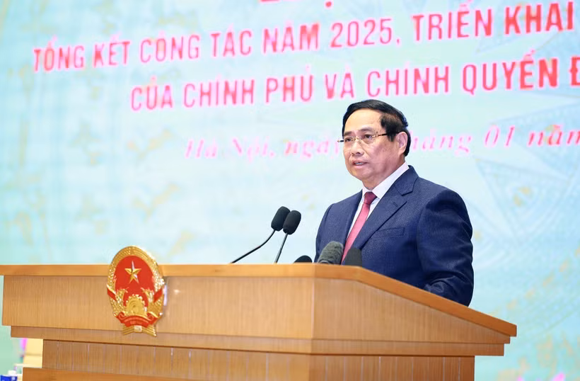 Le Premier ministre Pham Minh Chinh s'exprime lors de la conférence. Photo: VNA