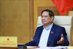 Le Premier ministre Pham Minh Chinh s'exprime lors de la réunion. Photo: VNA