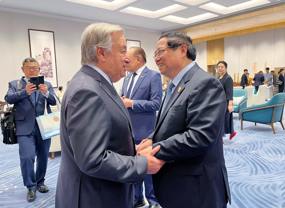 Le Premier ministre Pham Minh Chinh (à droite) et le secrétaire général de l’ONU António Guterres, à Tianjin, le 1er septembre. Photo : VNA pham-minh-chinh-antonio-guterres.jpg