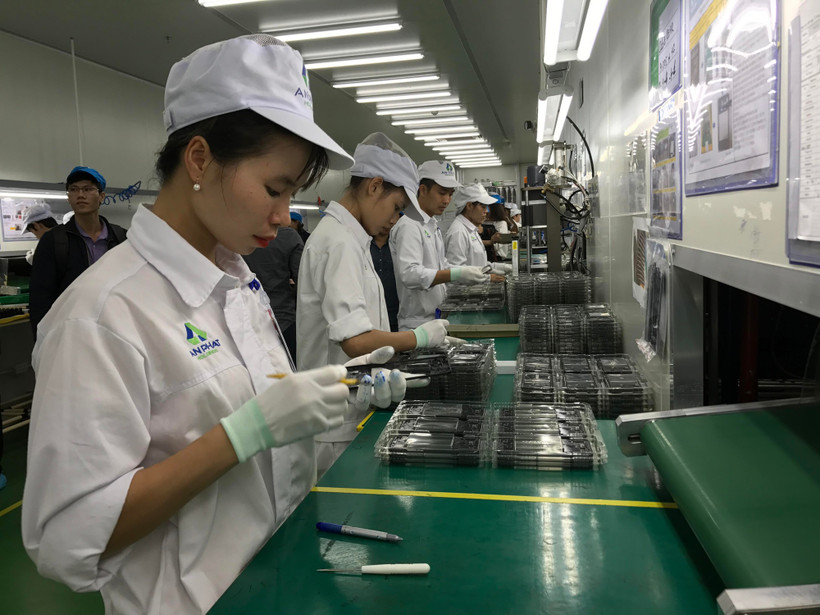 Les entreprises investissent dans la haute technologie, augmentant ainsi la valeur de leurs produits. Photo : VNA