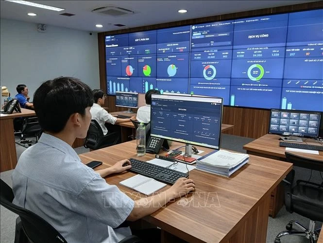 Du 21 au 23 juin, la ville de Dà Nang et la province de Quang Nam ont coordonné la mise en œuvre expérimentale du modèle d'administration locale à deux niveaux dans six nouvelles unités administratives. Photo: VNA