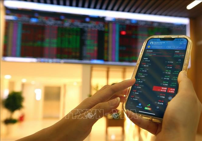 Le Vietnam consolide sa place sur la carte financière mondiale après le relèvement du classement de son marché boursier. Photo: VNA