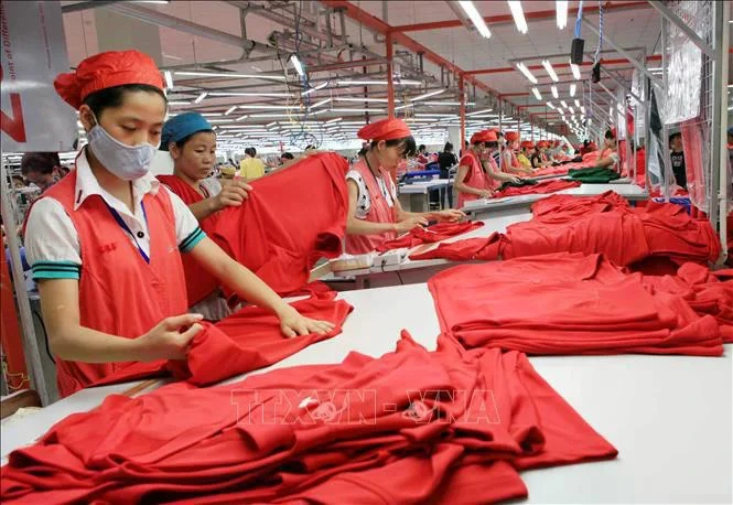 La Sarl Star a investi dans la construction d'une usine spécialisée dans la couture de tricots et de vêtements de sport destinés à l'exportation dans le parc industriel de Phu Nghia, district de Chuong My, à Hanoï. Photo: VNA