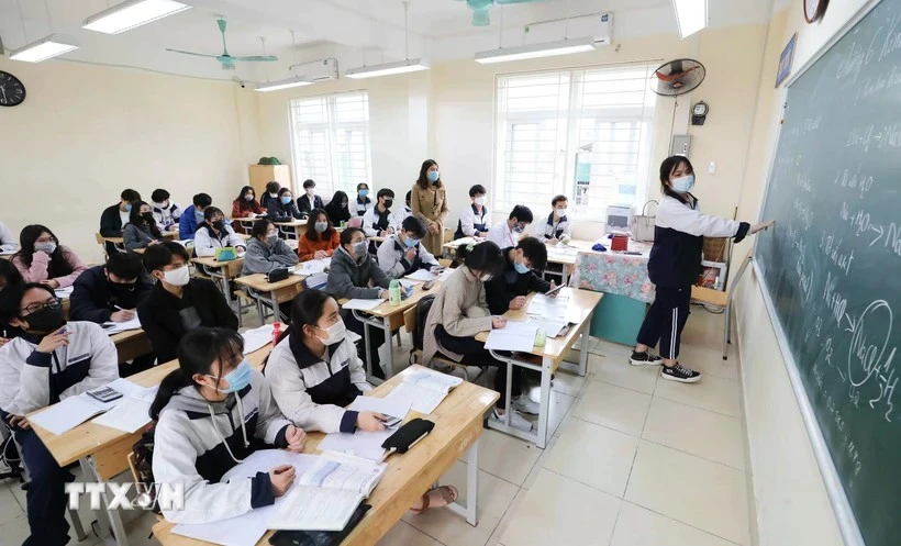 Avec 440 voix favorables sur 441 députés votants, l’Assemblée nationale a adopté la Résolution relative à l’exonération et au soutien des frais de scolarité pour les enfants d’âge préscolaire, les élèves de l’enseignement général et les apprenants suivant des programmes d’enseignement général dans les établissements du système éducatif national. Photo: VNA