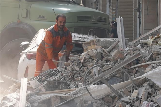 Bâtiments détruits après une frappe aérienne israélienne à Téhéran, en Iran, le 13 juin. Photo : Xinhua/VNA