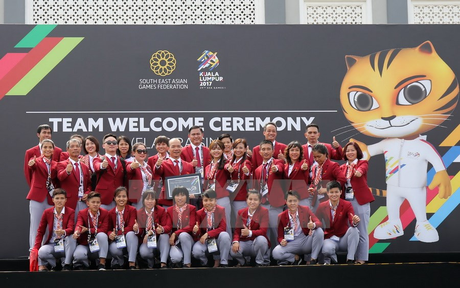 La délégation sportive du Vietnam lors de la cérémonie de lever des drapeaux des pays participant aux SEA Games 29.