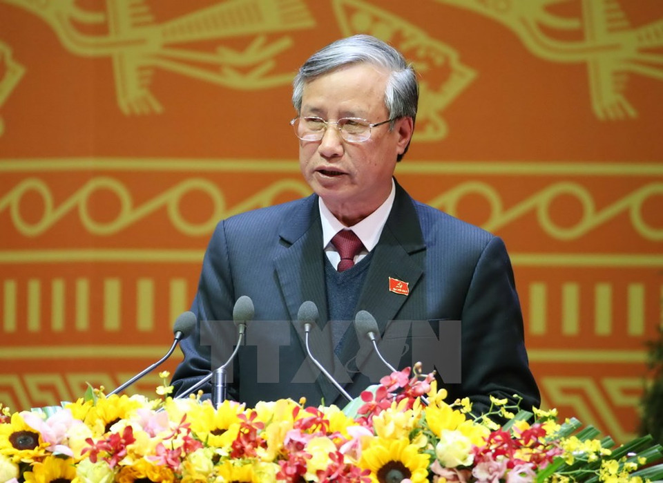 M. Tran Quoc Vuong, chef du secrétariat du Congrès, lit le projet de résolution du 12e Congrès du PCV