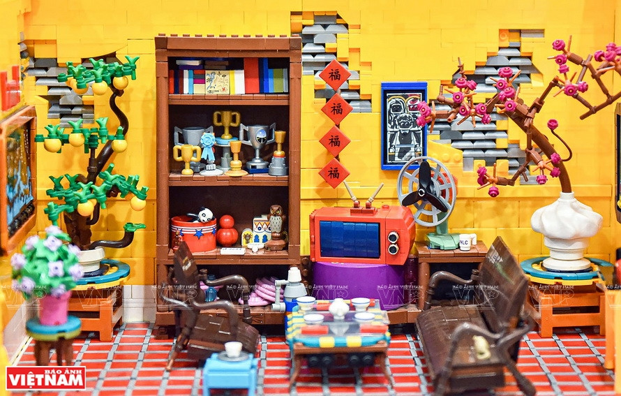 Une scène du salon des années 1990 pendant le Nouvel An lunaire inspirée de la maison d'enfance de Nguyen Huy Hoang. Photo: Vietnam Illustré