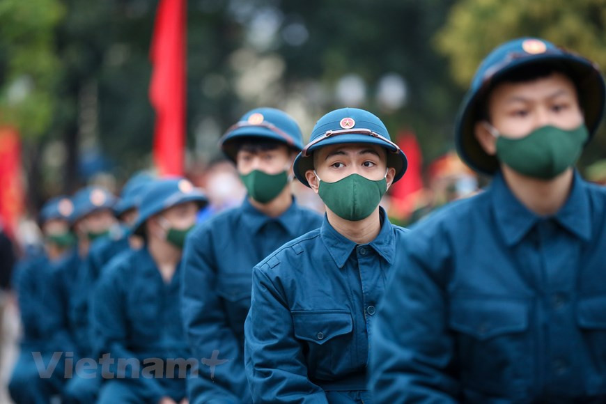  En 2021, Hanoï est chargée de recruter et d'appeler près de 4.500 jeunes hommes pour s'enrôler, effectuer les services militaire et policier. Photo: Vietnam+