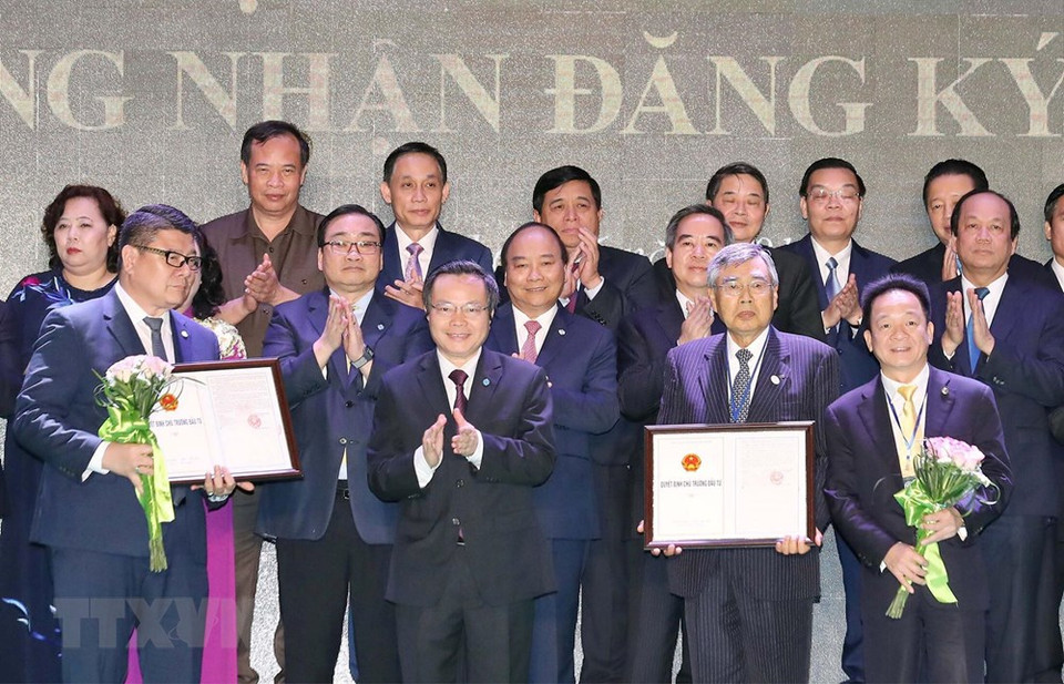 Le Premier ministre Nguyen Xuan Phuc à la cérémonie de signature d'accords et conventions de coopération de Hanoï