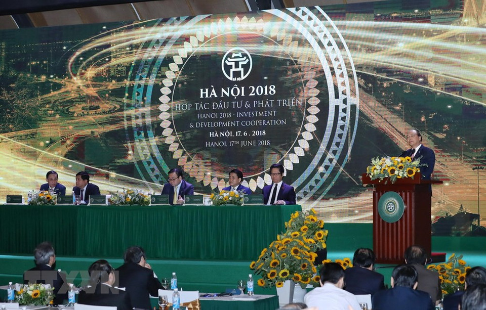 Le Premier ministre Nguyen Xuan Phuc prononce un discours à la conférence « Hanoï 2018 – Coopération, Investissement et Développement »