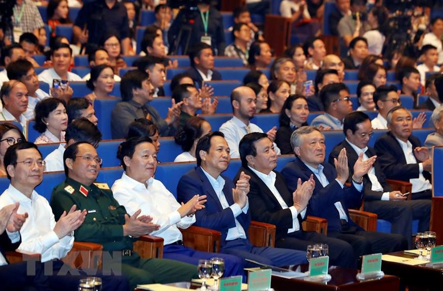 Des délégués participent au programme. Photo: VNA