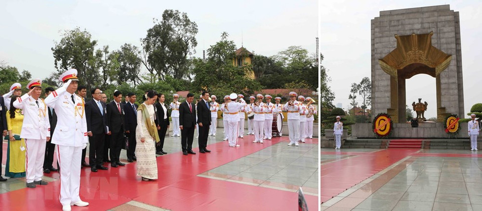 Mme Aung San Suu Kyi dépose une gerbe de fleurs au pied du Monument des Morts pour la Patrie à Hanoï. 