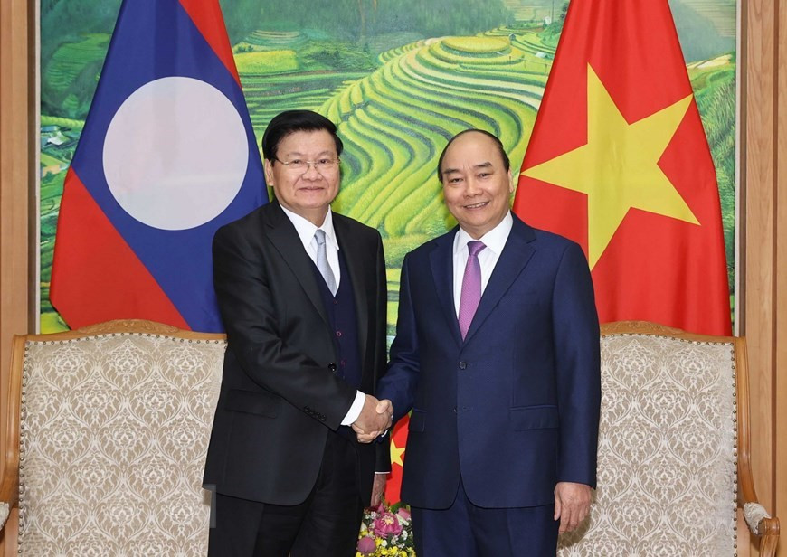 La 43e réunion du Comité intergouvernemental pour la coopération bilatérale Vietnam-Laos a eu lieu le 6 décembre à Hanoï, sous la co-présidence du Premier ministre Nguyen Xuan Phuc et de son homologue lao Thongloun Sisoulith. Photo: VNA