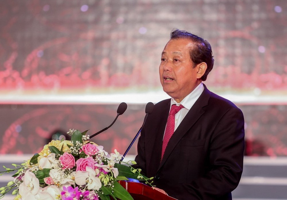 Le vice-Premier ministre permanent Truong Hoa Binh prend la parole à la cérémonie de reconnaissance de la fête du temple de Cua Ông en tant que vestige historique national spécial.